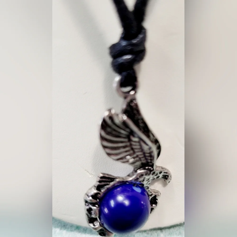 Necklace with Eagle holding a cobalt blue glass orb